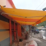 Services homepage icon image of Retractable-Awnings-structure-for-a-indian-store-front-area