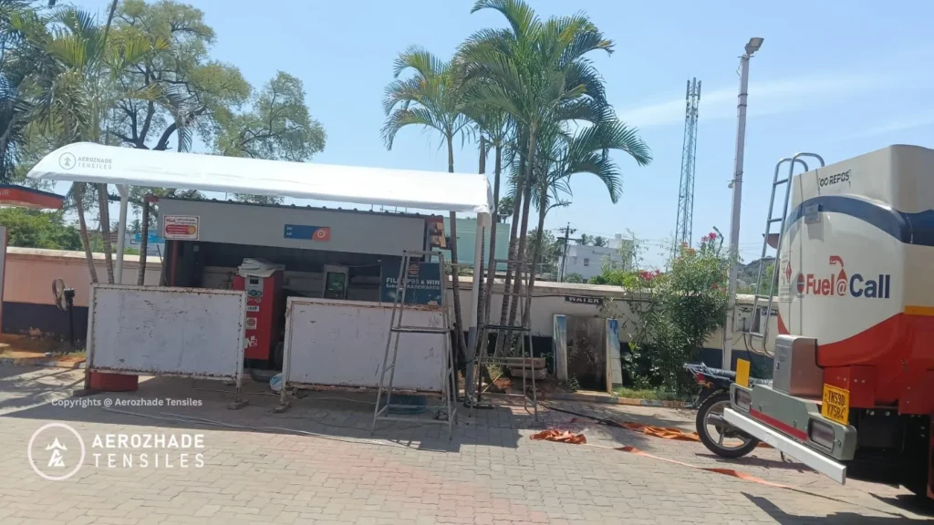 Tensile shade structure protection from rain and sun for a petrol station image front view Copyrights@Aerozhade Tensiles