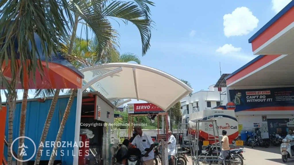 Tensile shade structure protection from rain and sun for a petrol station image side view 2 Copyrights@Aerozhade Tensiles